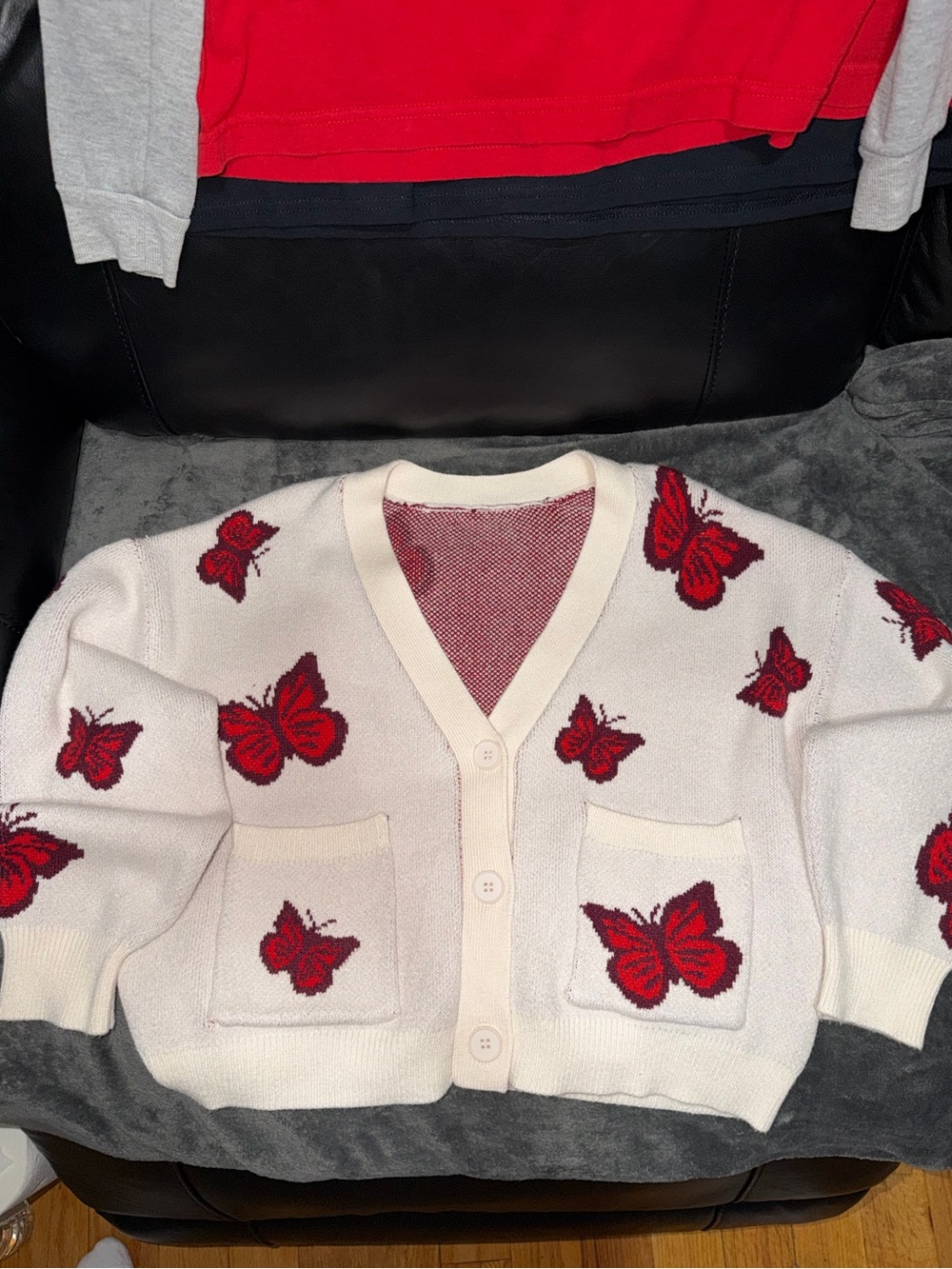 Cream Cardigan with Red Butterfly Motif